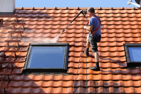 44174154 - roof cleaning with high pressure